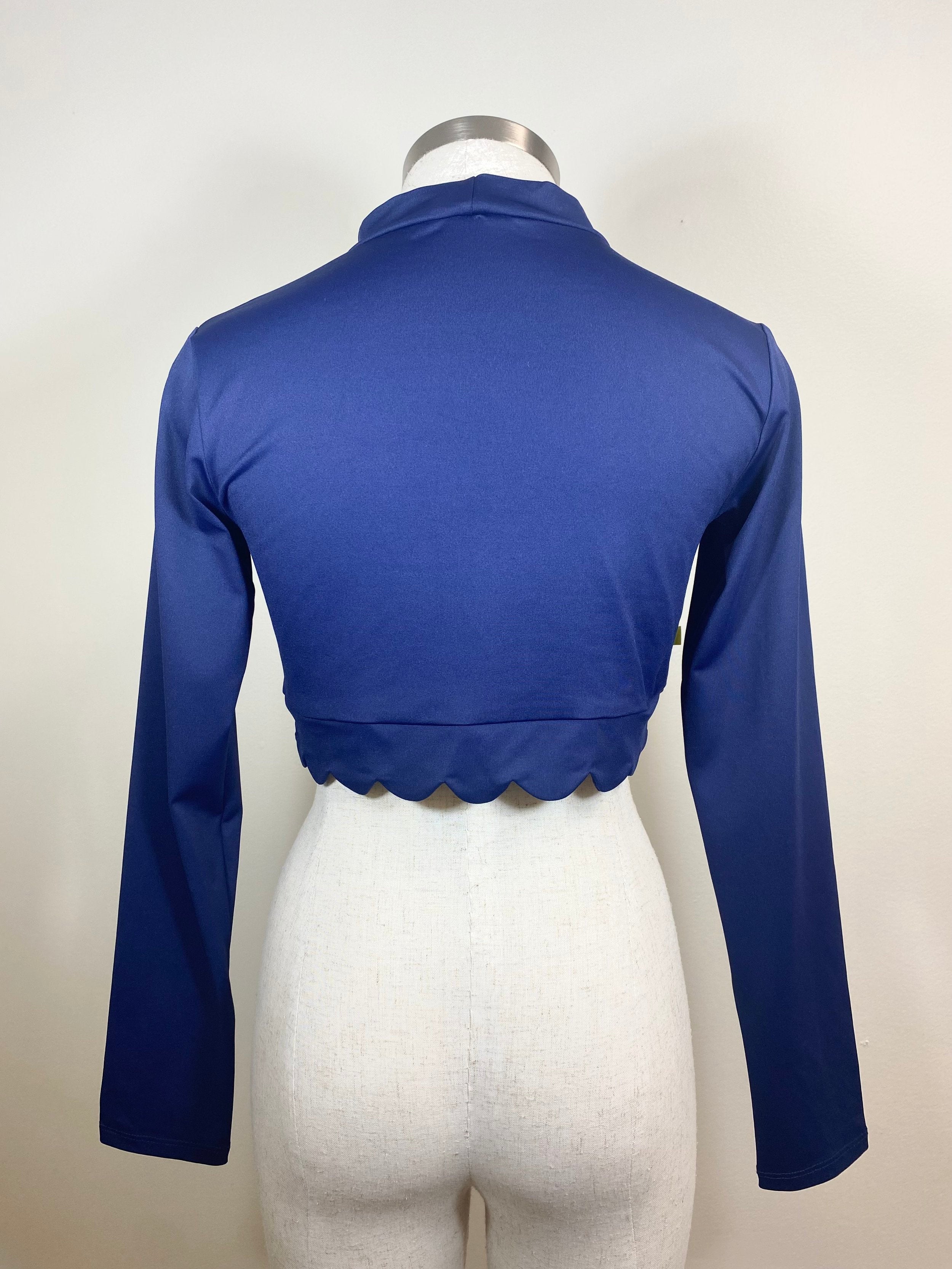 Back view of tennis shirt in navy for women with scalloped edge