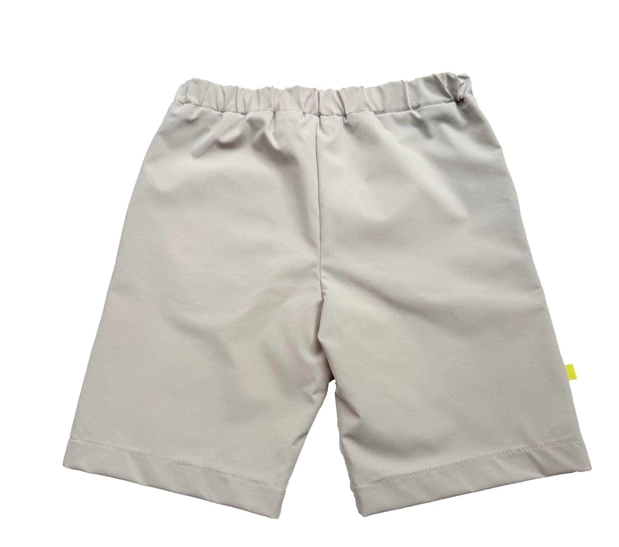 Back view of tan shorts for youth boys