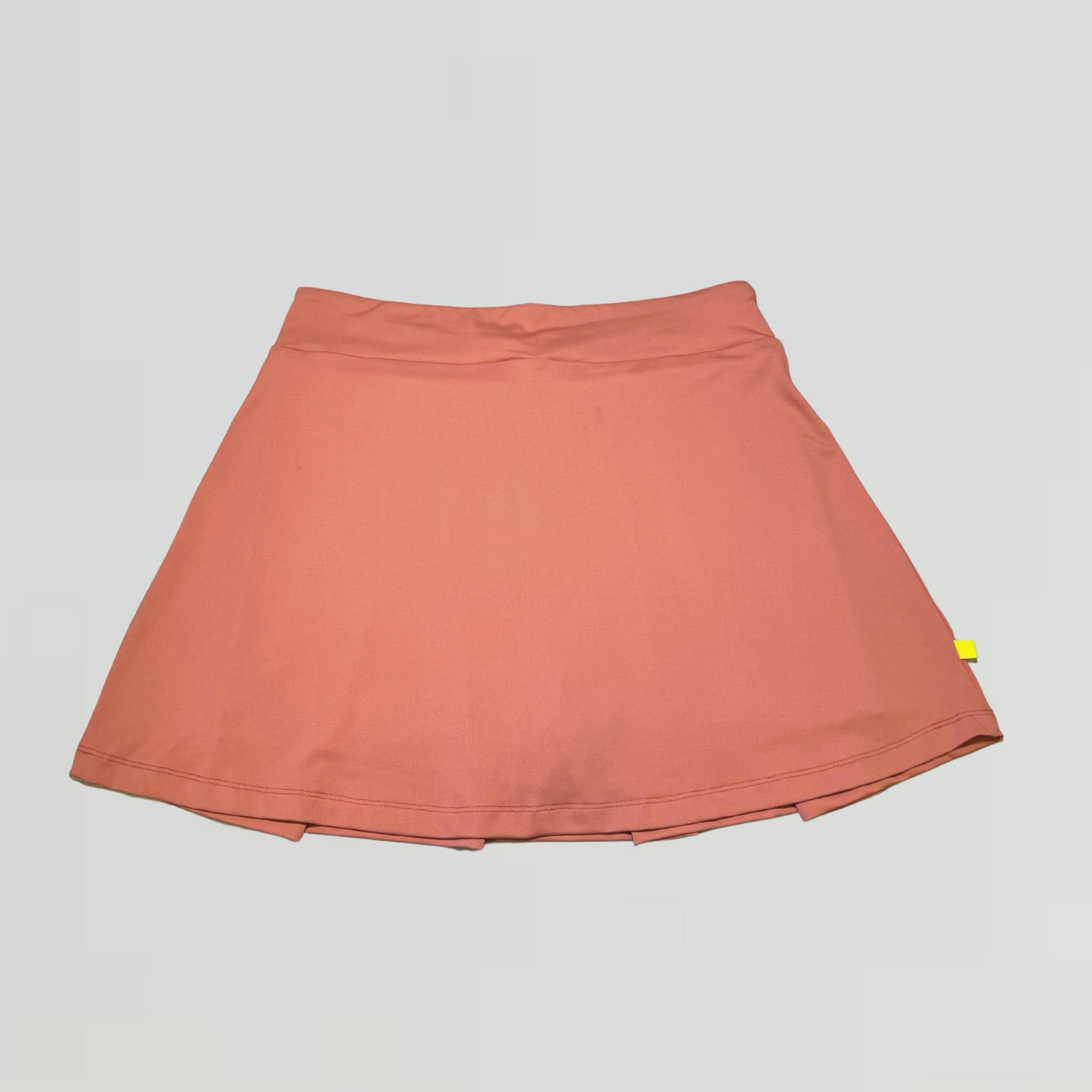 Back view of women's pleated skort