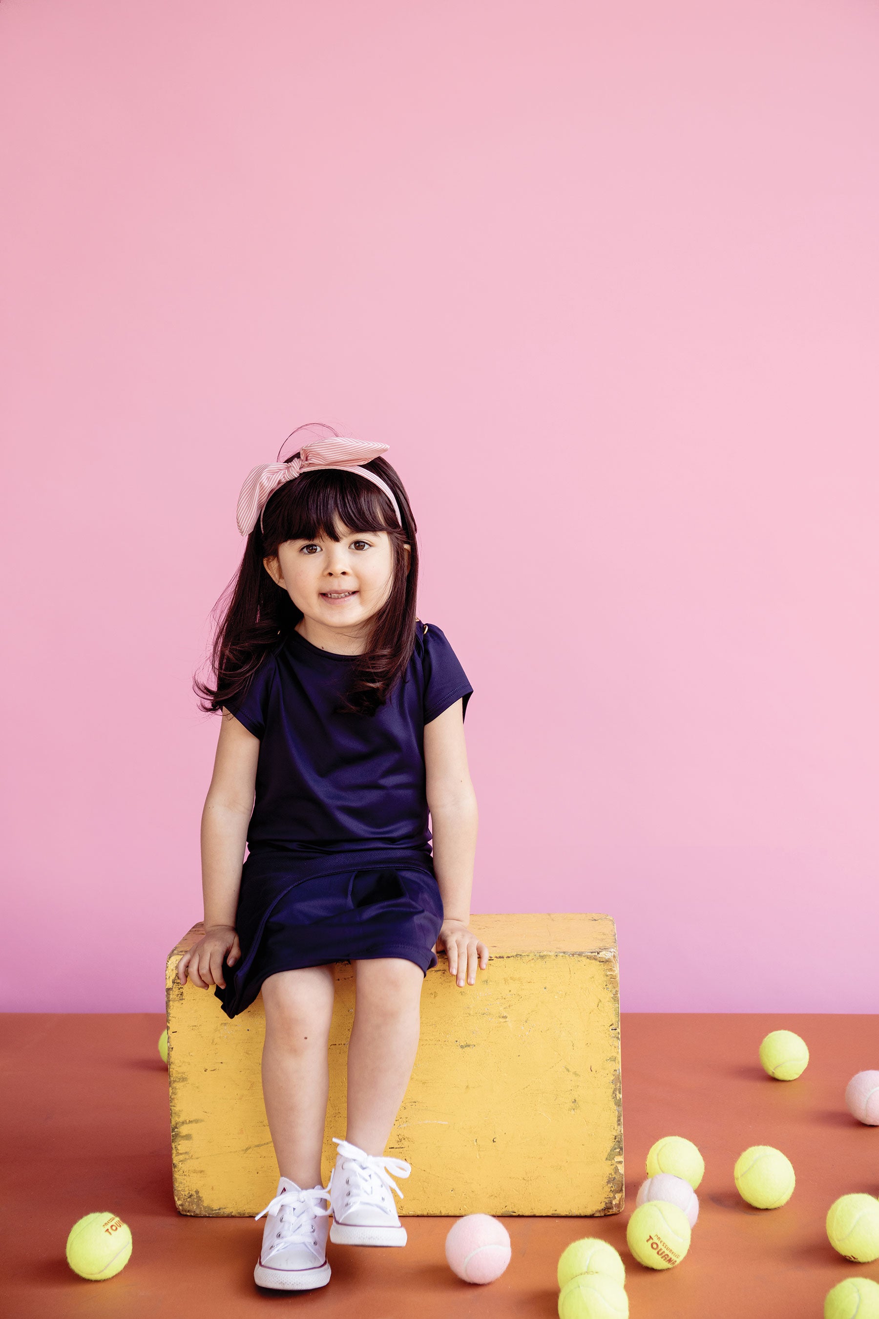 Navy tennis skort for kids with matching navy tennis t-shirt.