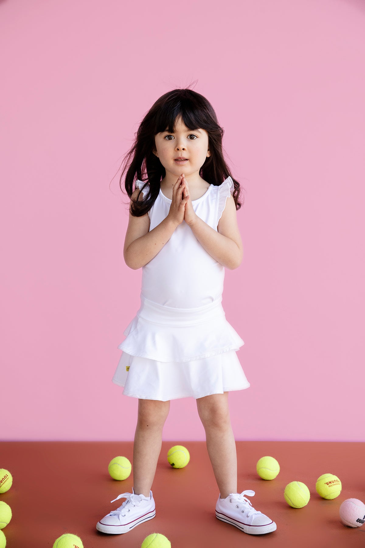 White tennis skort with ruffles for kids