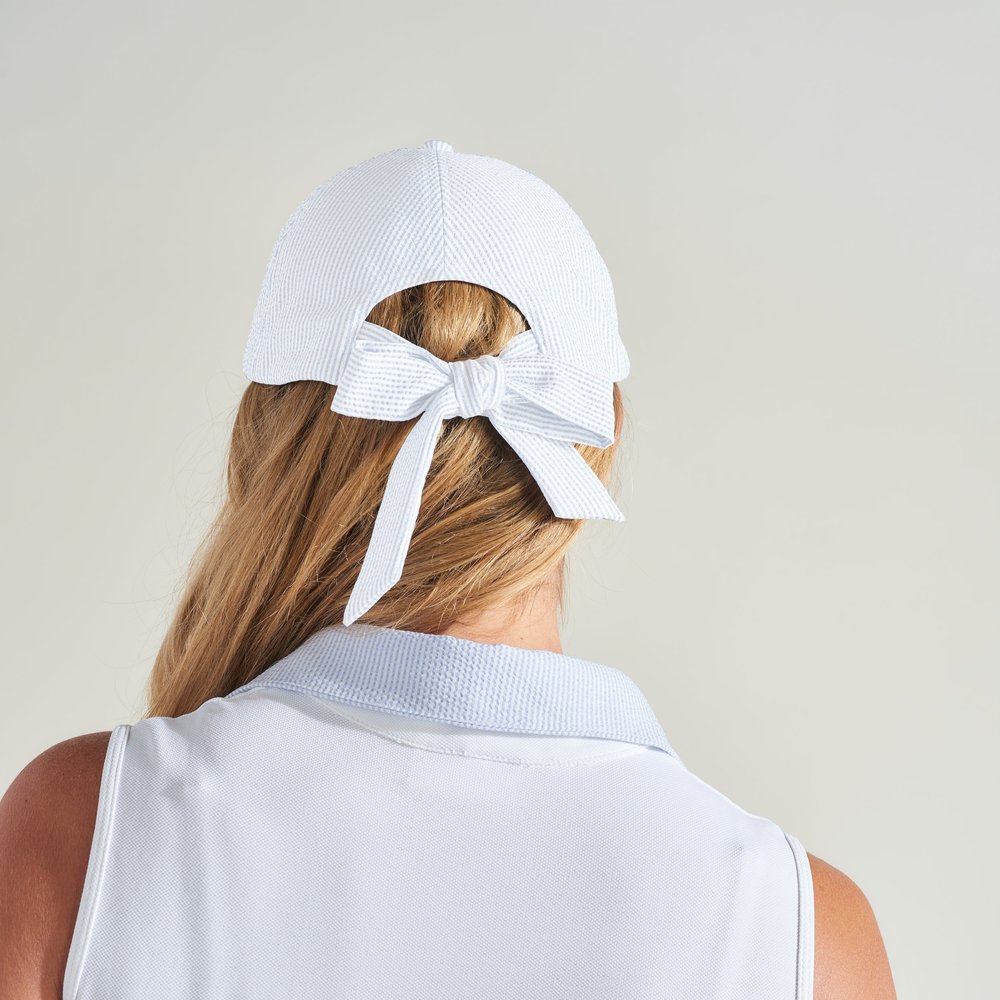 Back view of white tennis hat with ribbon tie