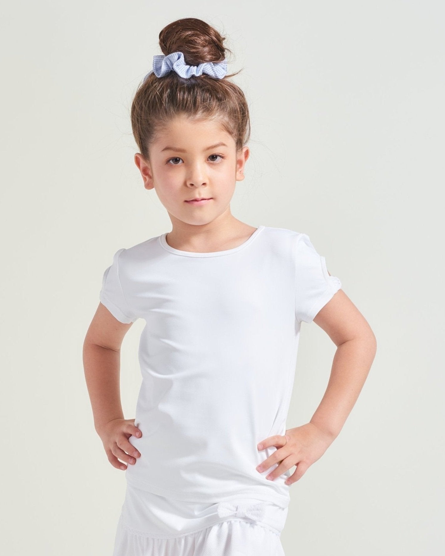 All white tennis shirt with matching tennis skort for girls